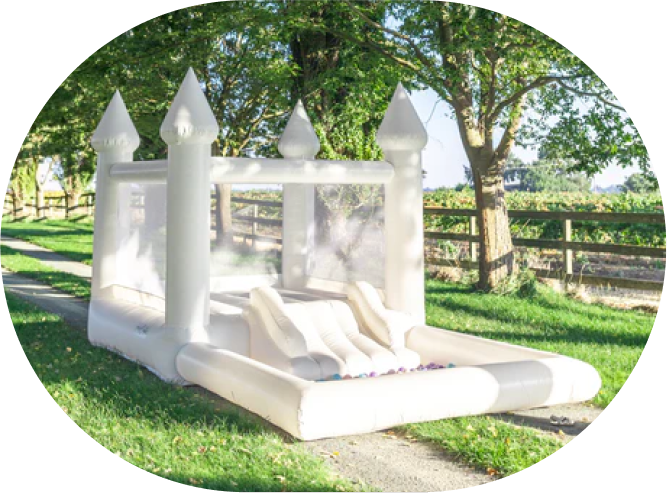 Drive By My Party beautiful white party rentals in Chicago wedding white bounce house rentals